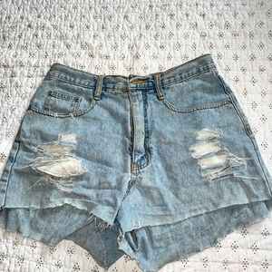 Light denim blue high waisted ripped jean shorts